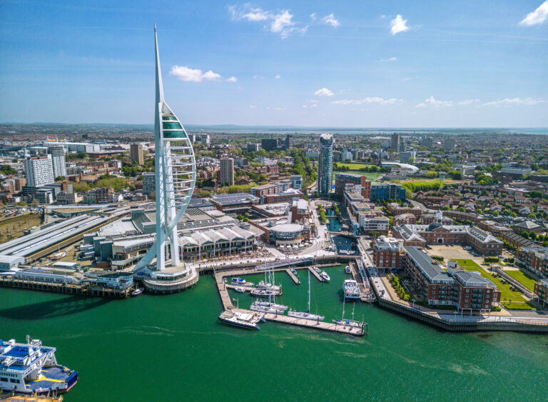 The drone aerial view of Spinnaker Tower and Portsmouth Harbour. Portsmouth is a port city and unitary authority in Hampshire, England